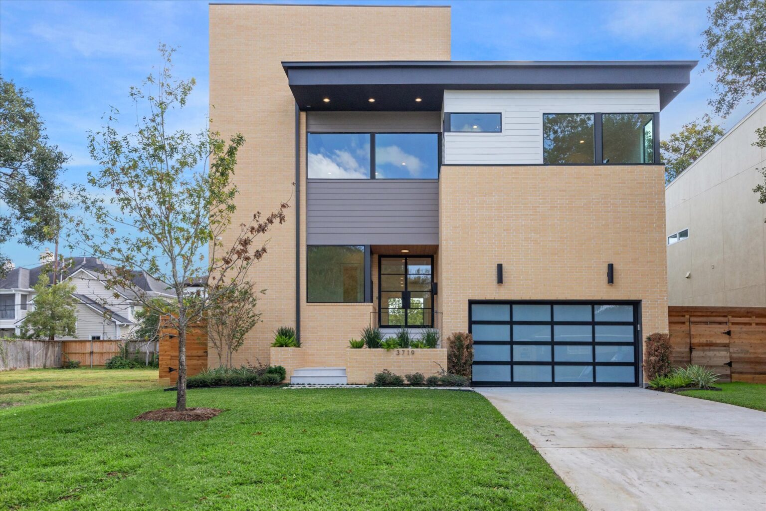 Home built by Scale Design+Build at dusk