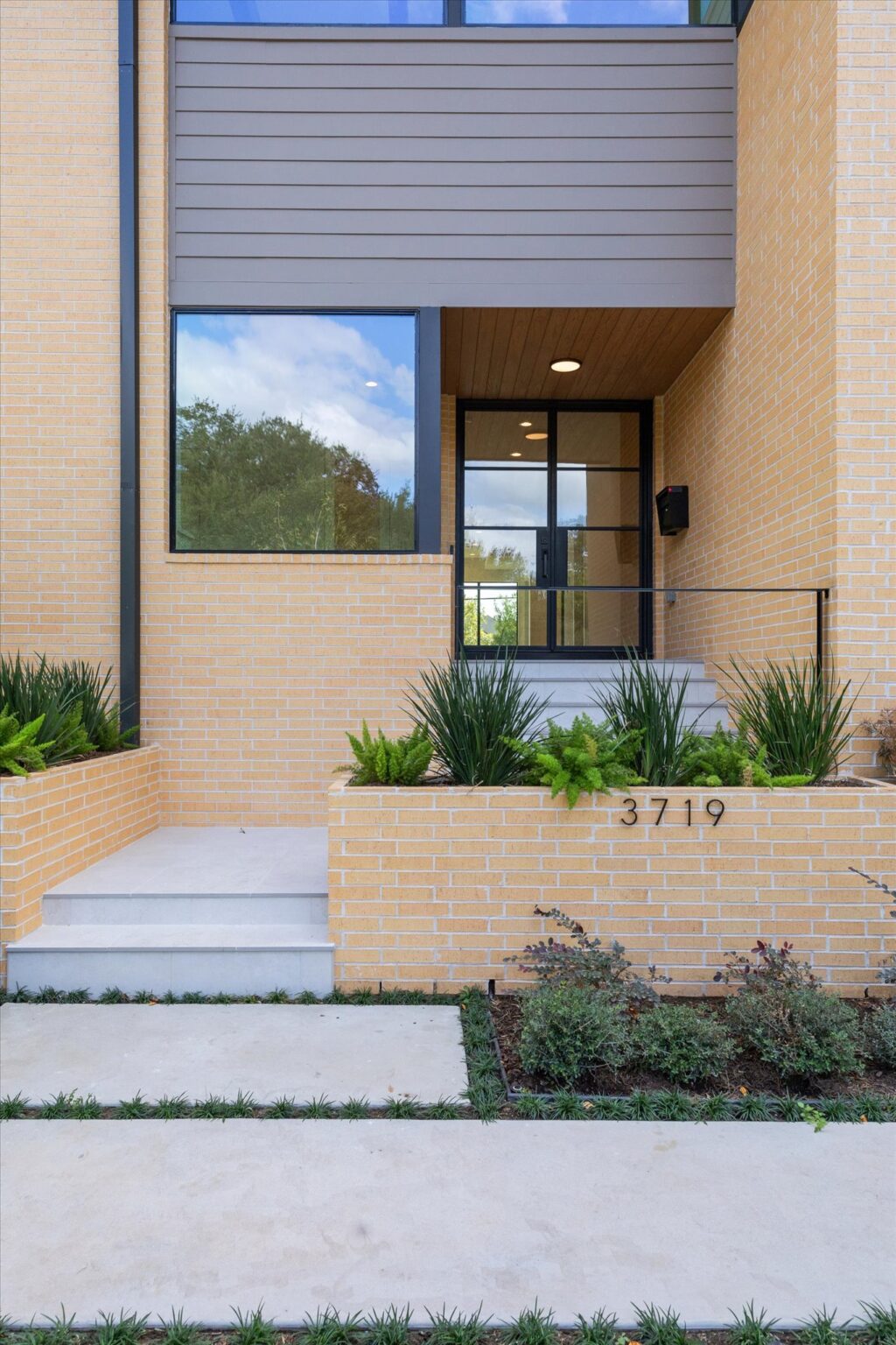 Home built by Scale Design+Build at dusk